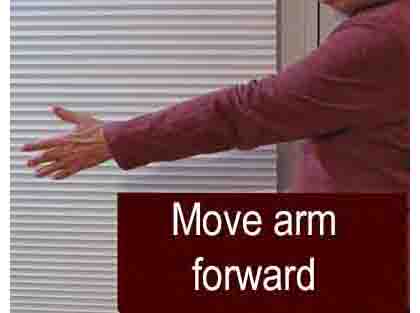 photo shows the left arm reaching forward, as if to shake hands
